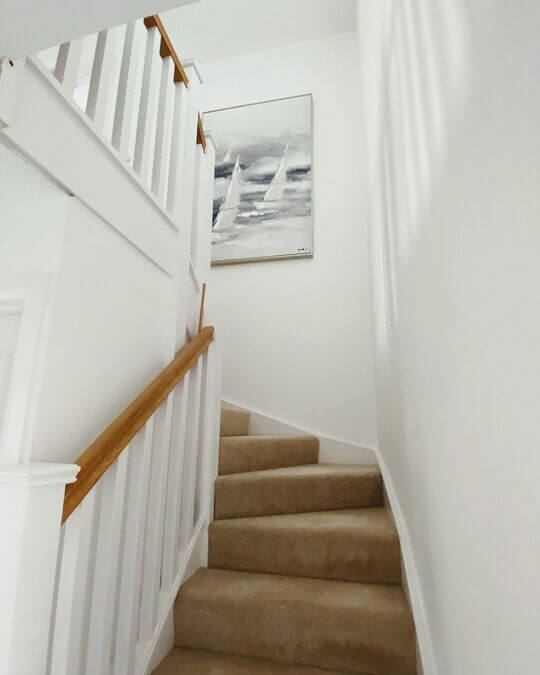 black meta glass clamp on smoke glass balustrade